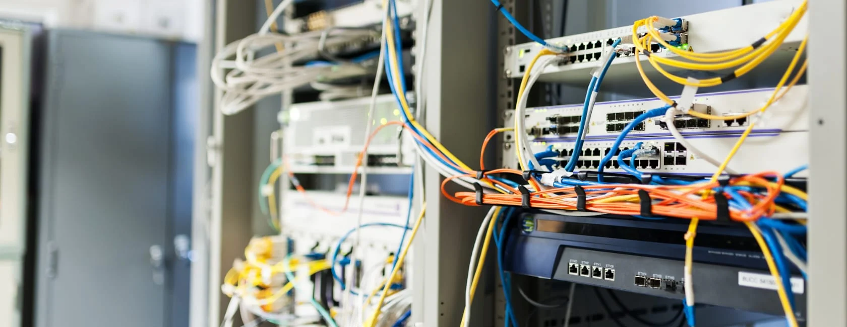 Intermediate Distribution Frame IT room with organized network cabling and equipment