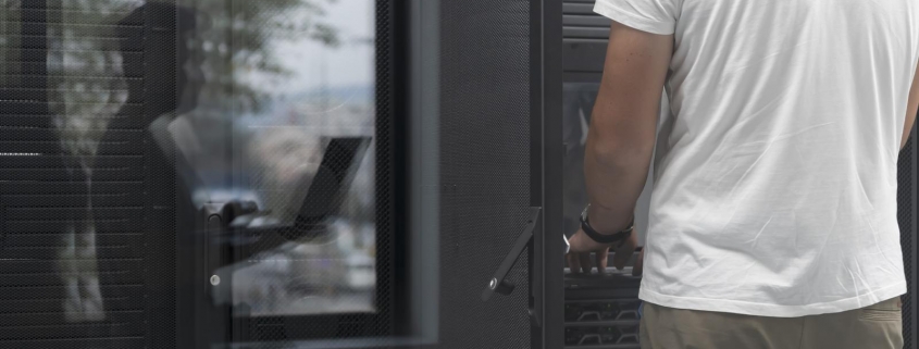 technicians team updating hardware inspecting system performance in super computer server room or cryptocurrency mining farm